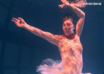 Bulava Lozhkova with a red tie and skirt underwater