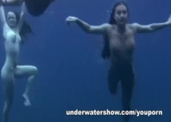 THREE GIRLS SWIMMING NUDE IN THE SEA